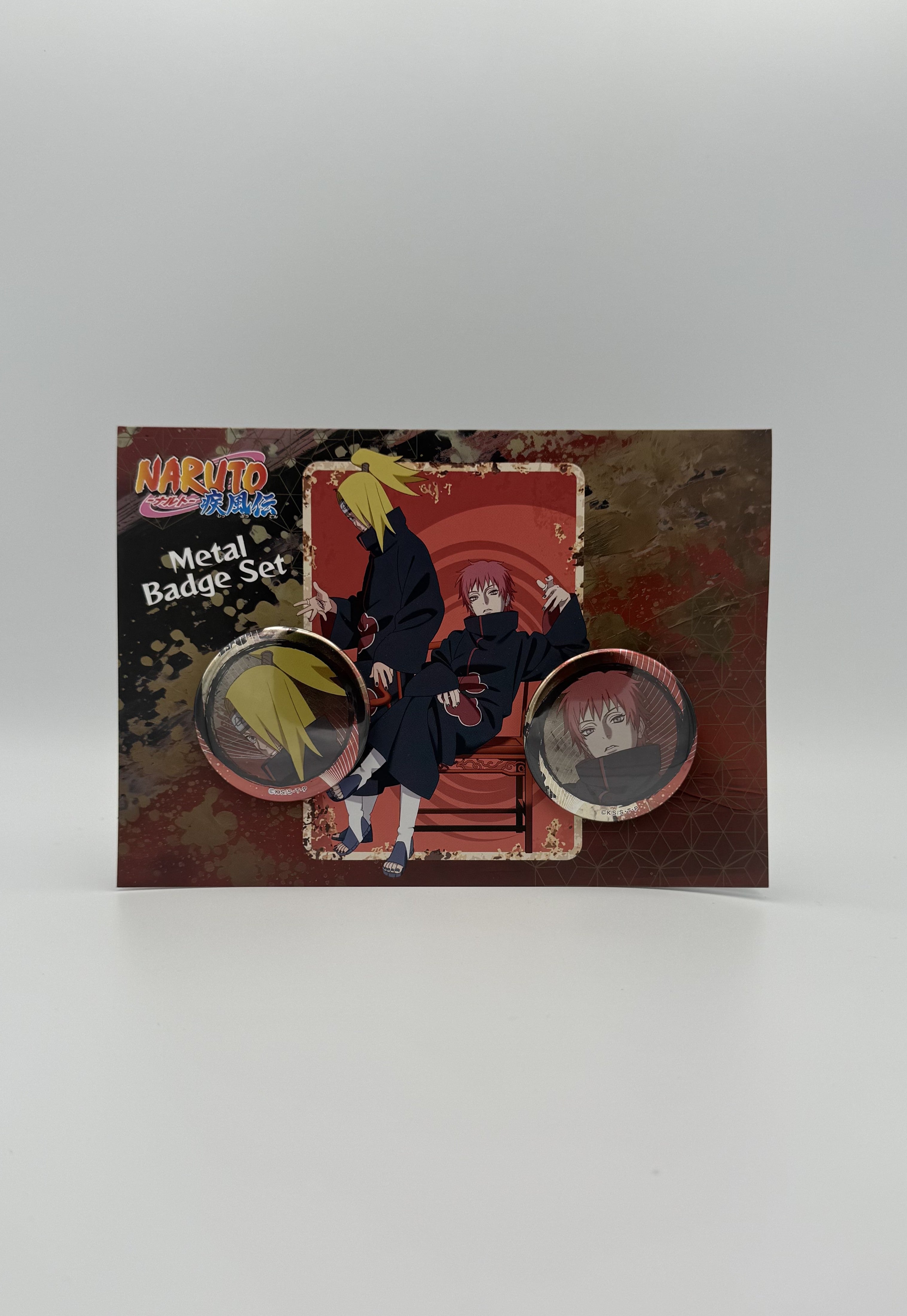 Naruto Shippuden – Akatsuki Deidara & Sasori Metal Badge Set (2pcs)